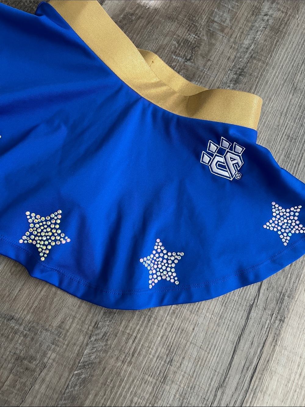 Cheer Athletics gold and royal blue skort with rhinestone stars size Youth L - Picture 3 of 16